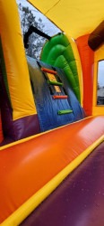 oyp20ins 1715795467 Orange Yellow and Purple Bounce House with Slide